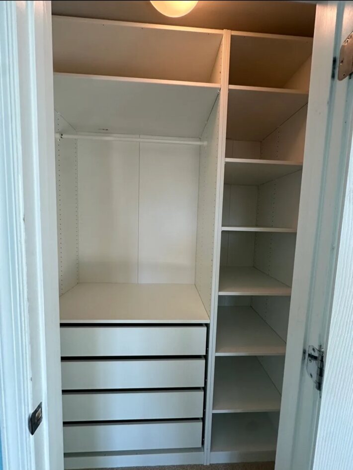Reach-in closet organizer with drawers and shelves